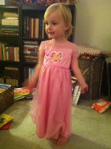 So glad we captured this moment...the very first time Emma put on her "beautiful dress. 